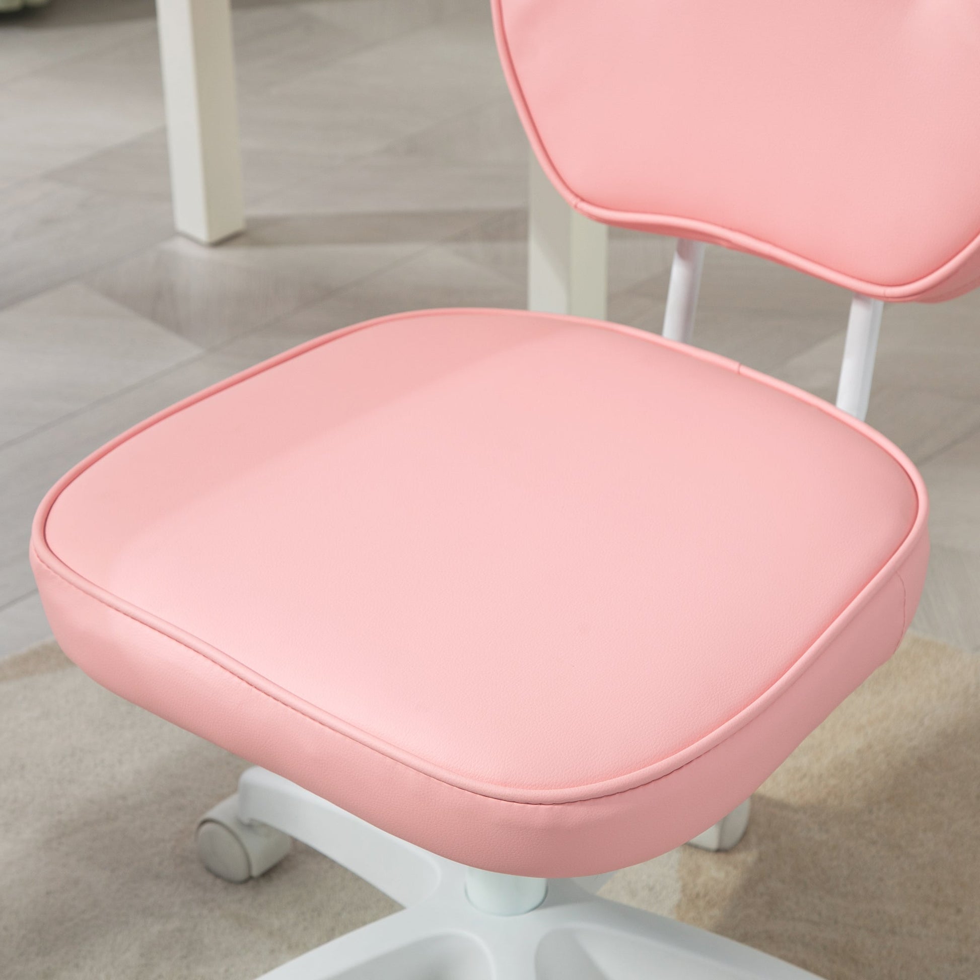 HOMCOM Cute Armless Office Chair, Small PU Leather Computer Desk Chair, Vanity Task Chair with Adjustable Height, Swivel Wheels, Mid Back, Pink